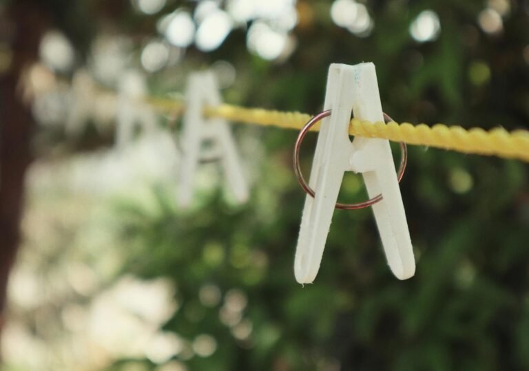 rope with clothespins hanging on laundry string