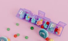 a variety of candies in a pill organizer